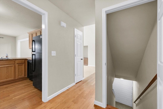2303 Blanche Ln Unit B, Champaign, IL 61822 - corridor with light wood finished floors and a sink