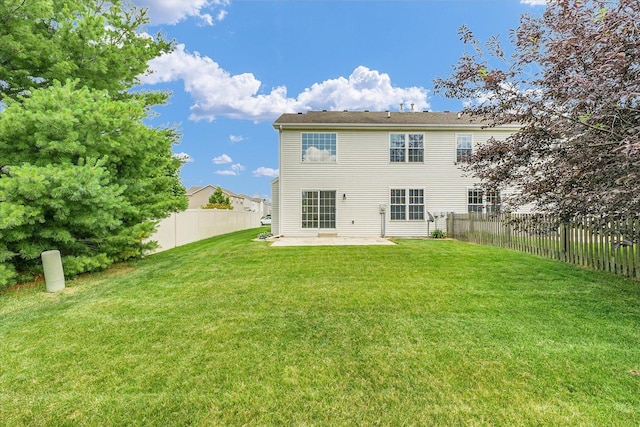 2303 Blanche Ln Unit B, Champaign, IL 61822 - rear view of property featuring a patio and a fenced backyard