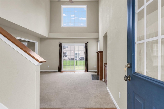 2303 Blanche Ln Unit B, Champaign, IL 61822 - carpeted entryway featuring a high ceiling and a ceiling fan