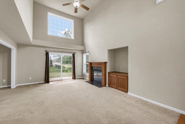2303 Blanche Ln Unit B, Champaign, IL 61822 - unfurnished living room featuring high vaulted ceiling, a ceiling fan, carpet flooring, and a fireplace