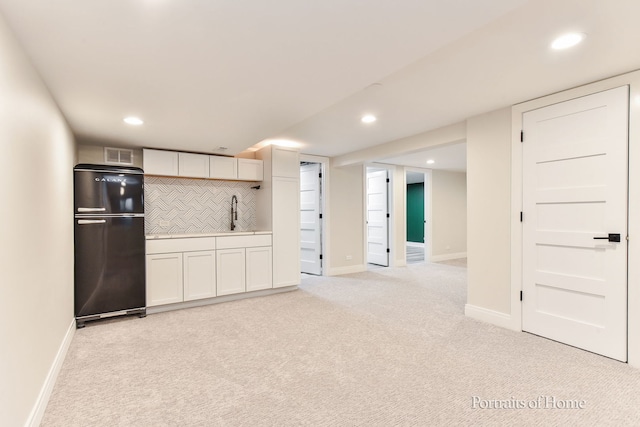 631 S Whispering Hills Dr, Naperville, IL 60540 - kitchen with freestanding refrigerator, light carpet, recessed lighting, backsplash, and light countertops