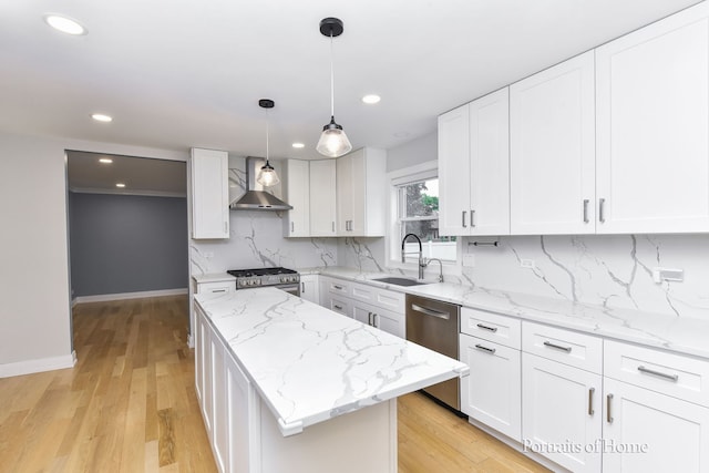631 S Whispering Hills Dr, Naperville, IL 60540 - kitchen with appliances with stainless steel finishes, wall chimney exhaust hood, a center island, white cabinets, and backsplash