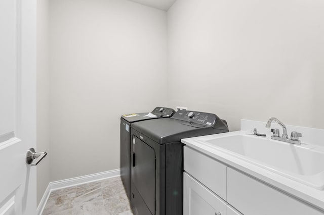 6375 Jasmine Ave, Portage, IN 46368 - laundry area with washer and dryer, cabinet space, and baseboards