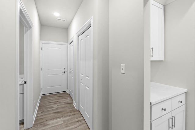 6375 Jasmine Ave, Portage, IN 46368 - hall with light wood-type flooring and baseboards