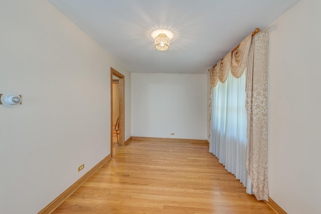1825 W Sherry Ln, Addison, IL 60101 - spare room with light wood finished floors and baseboards