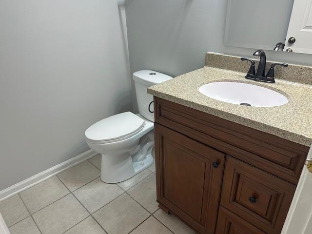1127 Orleans Dr, Mundelein, IL 60060 - bathroom with vanity, toilet, tile patterned flooring, and baseboards