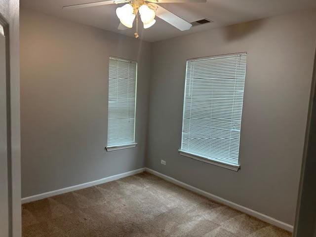 1127 Orleans Dr, Mundelein, IL 60060 - carpeted empty room featuring ceiling fan and baseboards