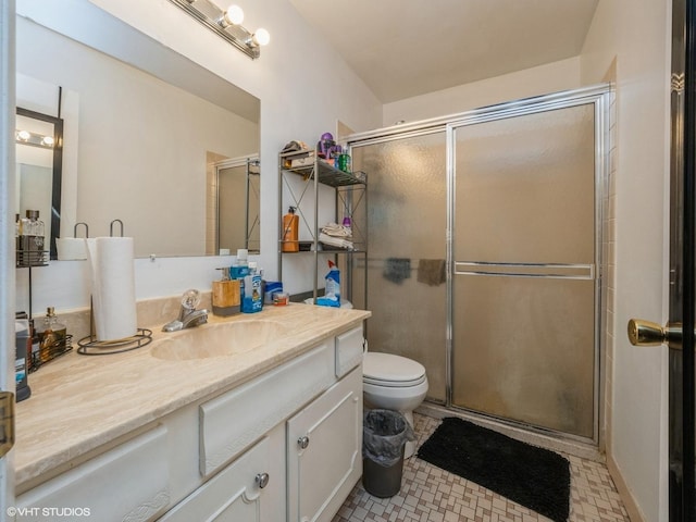 522 E Algonquin Rd Unit 200, Schaumburg, IL 60173 - bathroom featuring vanity, a stall shower, and toilet