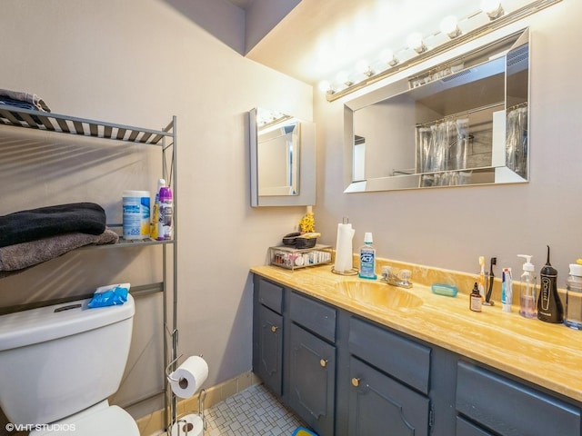 522 E Algonquin Rd Unit 200, Schaumburg, IL 60173 - full bath featuring vanity, tile patterned flooring, and toilet