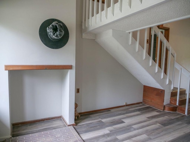 510 W Harrison St, Villa Grove, IL 61956 - stairway featuring wood finished floors and baseboards