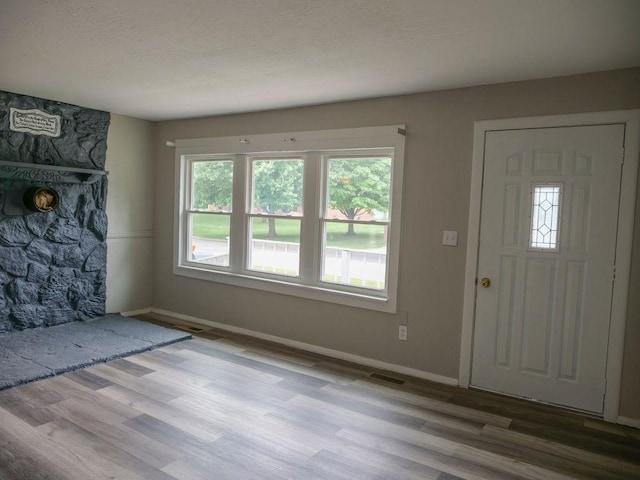 510 W Harrison St, Villa Grove, IL 61956 - entrance foyer featuring wood finished floors and baseboards