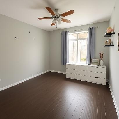 unfurnished bedroom featuring dark wood-type flooring, baseboards, and ceiling fan