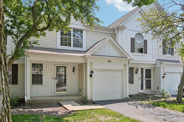 189 Port Royal Cir, Aurora, IL 60504 - multi unit property featuring board and batten siding, driveway, and roof with shingles