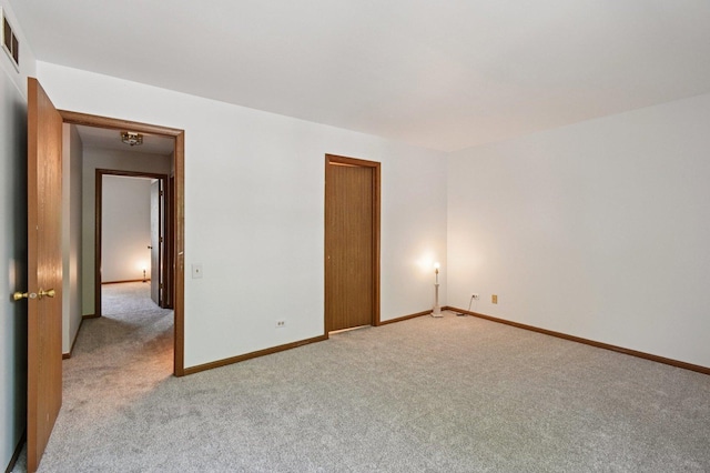 189 Port Royal Cir, Aurora, IL 60504 - empty room featuring light colored carpet and baseboards