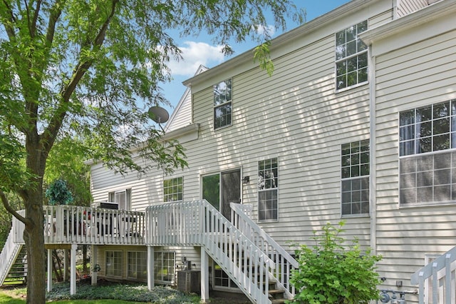 189 Port Royal Cir, Aurora, IL 60504 - rear view of house with stairway and a deck