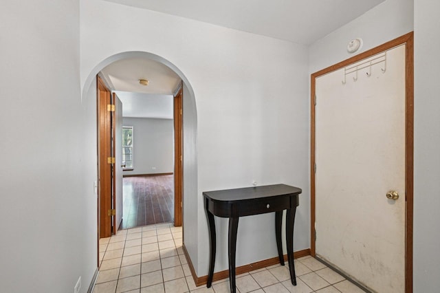 189 Port Royal Cir, Aurora, IL 60504 - corridor with arched walkways and light tile patterned floors