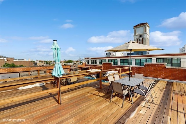 2540 W Diversey Ave Unit 404, Chicago, IL 60647 - wooden terrace featuring outdoor dining area