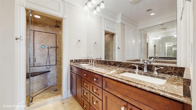 2540 W Diversey Ave Unit 404, Chicago, IL 60647 - full bathroom with double vanity, a shower stall, ornamental molding, and tile patterned flooring
