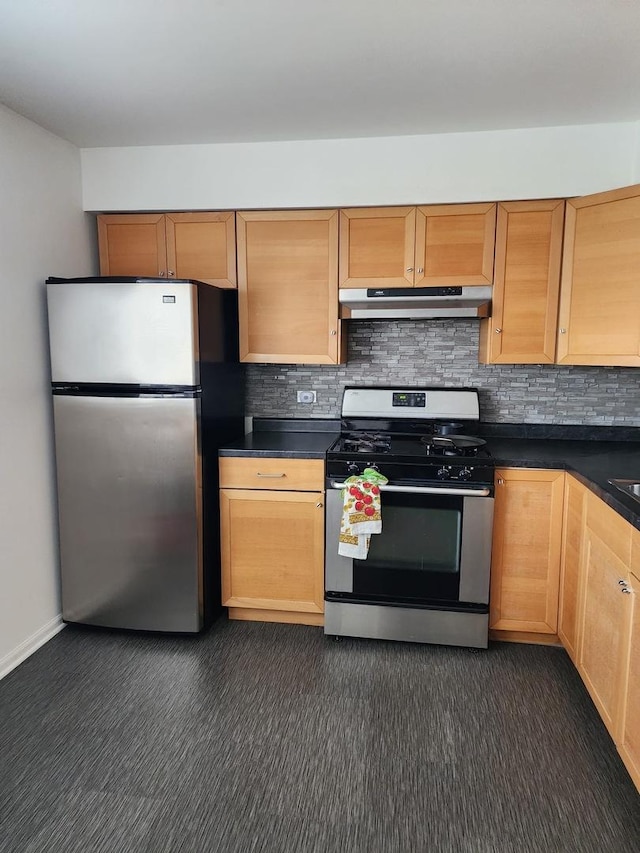 659 E Fullerton Ave Unit 201, Glendale Heights, IL 60139 - kitchen featuring stainless steel appliances, under cabinet range hood, dark countertops, backsplash, and dark carpet
