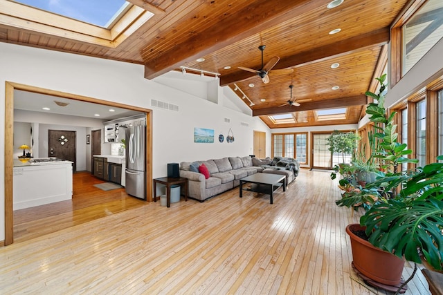 28 Lions Rd, Sandwich, IL 60548 - living area with a skylight, ceiling fan, light wood-style floors, a wood ceiling with exposed beams, and recessed lighting