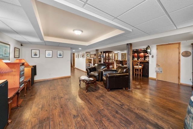 28 Lions Rd, Sandwich, IL 60548 - living area featuring bar, wood finished floors, and a drop ceiling