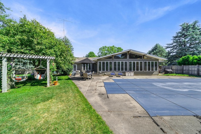 28 Lions Rd, Sandwich, IL 60548 - rear view of property featuring a patio area, a sunroom, and a pergola