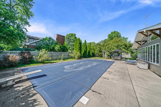 28 Lions Rd, Sandwich, IL 60548 - view of pool featuring a gazebo, a fenced backyard, and a patio