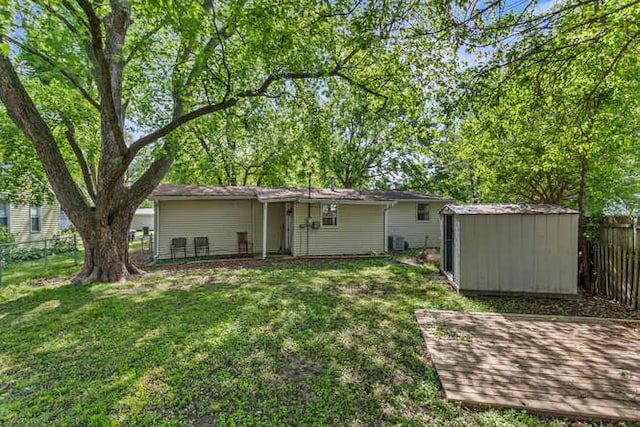 1003 S Pleasantview Dr, Tuscola, IL 61953 - back of house featuring central AC unit