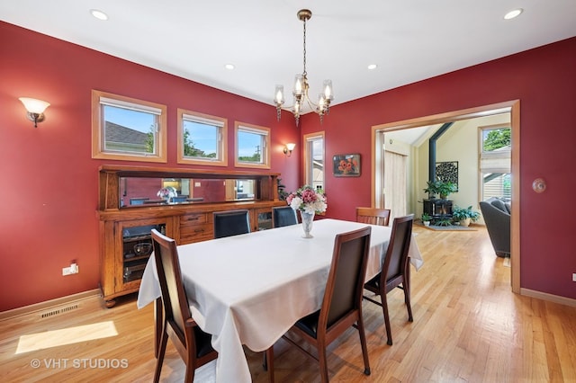 9008 Marmora Ave, Morton Grove, IL 60053 - dining room with a chandelier, light wood-style floors, and recessed lighting