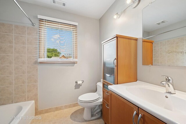 9008 Marmora Ave, Morton Grove, IL 60053 - full bathroom featuring vanity, tile patterned floors, and bathing tub / shower combination