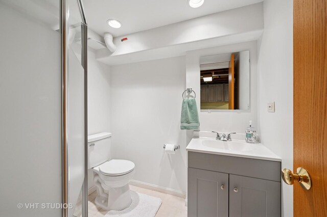 9008 Marmora Ave, Morton Grove, IL 60053 - bathroom with vanity, a shower with door, and tile patterned floors
