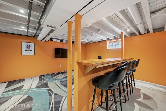 9008 Marmora Ave, Morton Grove, IL 60053 - indoor dry bar featuring concrete floors
