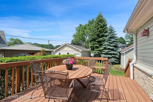 9008 Marmora Ave, Morton Grove, IL 60053 - wooden terrace featuring outdoor dining area