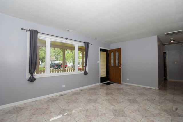 19421 W Hoag Ct, Mundelein, IL 60060 - empty room with baseboards and tile patterned flooring