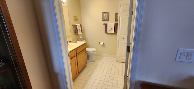9355 Irving Park Rd Unit 208, Schiller Park, IL 60176 - bathroom featuring vanity, toilet, and tile patterned flooring