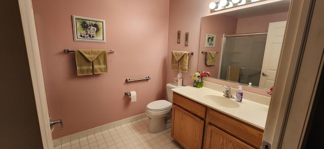 9355 Irving Park Rd Unit 208, Schiller Park, IL 60176 - full bath with vanity, toilet, a shower with shower door, tile patterned flooring, and baseboards