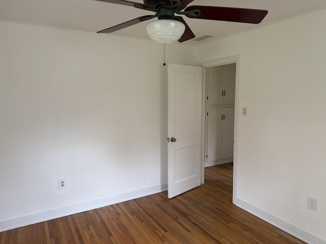 1310 S Sumner St, Wheaton, IL 60187 - empty room with a ceiling fan, baseboards, wood finished floors, and crown molding
