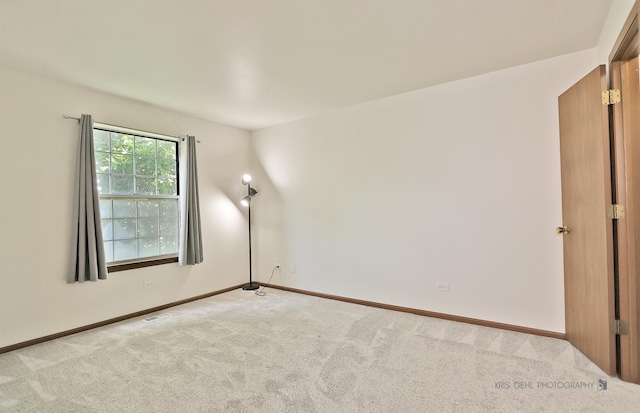 620 Mallard Ct Unit C1, Bartlett, IL 60103 - empty room with light colored carpet and baseboards
