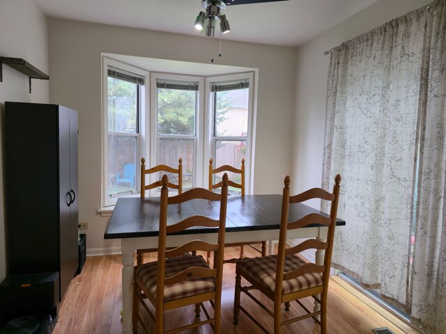 1246 Robin Dr, Carol Stream, IL 60188 - dining space featuring a ceiling fan and light wood-style floors