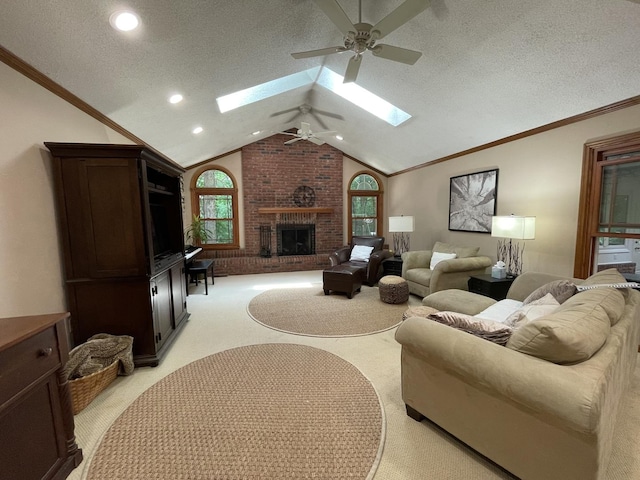 26136 E 2200 N Rd, Lexington, IL 61753 - living area featuring a ceiling fan, a skylight, a fireplace, light carpet, and vaulted ceiling