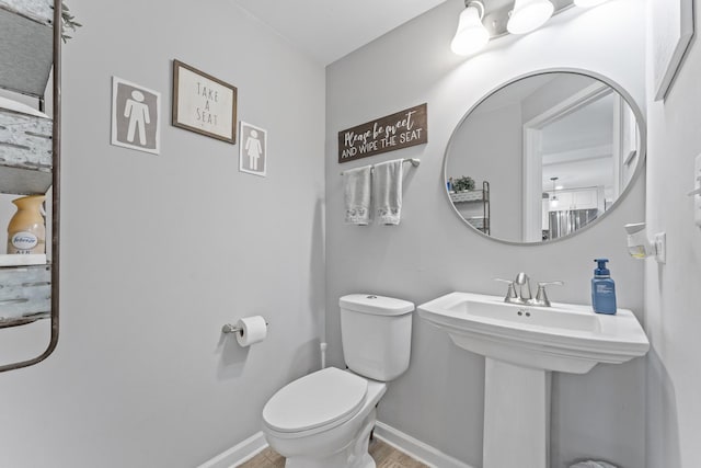 221 N 6th St, Saint Charles, IL 60174 - bathroom featuring toilet and baseboards