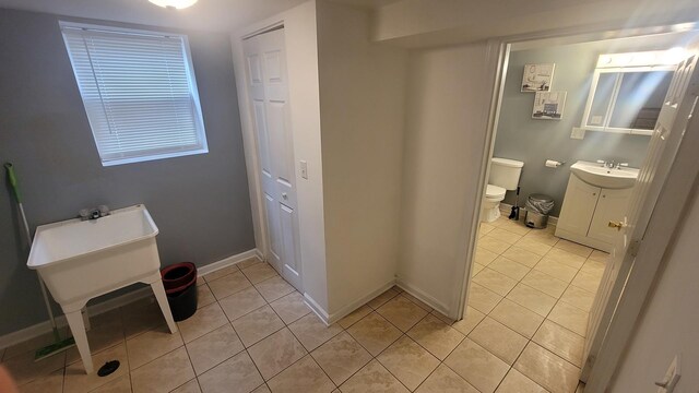 2676 N Julian Ter, River Grove, IL 60171 - bathroom featuring vanity, toilet, tile patterned floors, and baseboards