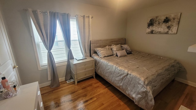2676 N Julian Ter, River Grove, IL 60171 - bedroom with light wood-type flooring and baseboards