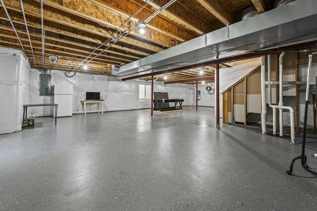 2023 Torino Dr, Elgin, IL 60123 - below grade area with freestanding refrigerator and electric panel