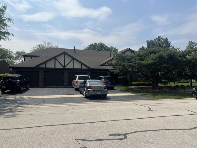 18040 Royal Oak Ct Unit 2, Tinley Park, IL 60477 - english style home with concrete driveway and an attached garage