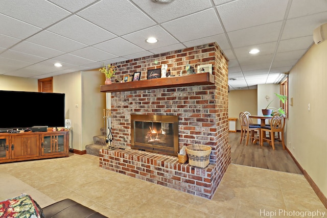 1415 Arabian Spur, Mchenry, IL 60051 - living room featuring a drop ceiling, tile patterned floors, a fireplace, and recessed lighting