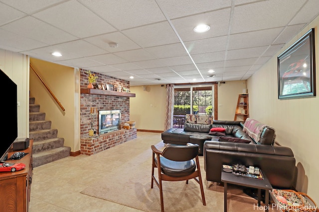 1415 Arabian Spur, Mchenry, IL 60051 - tiled living area featuring a drop ceiling, a fireplace, stairway, and recessed lighting