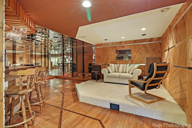 1415 Arabian Spur, Mchenry, IL 60051 - living room with wooden walls, hardwood / wood-style flooring, and recessed lighting