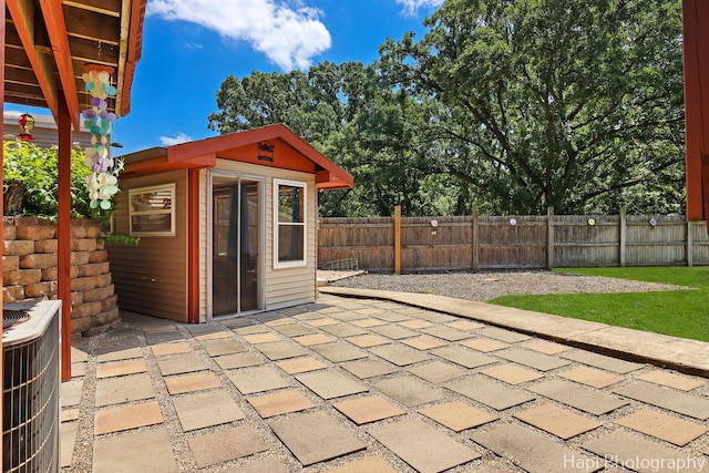 1415 Arabian Spur, Mchenry, IL 60051 - fenced backyard with a patio and an outdoor structure