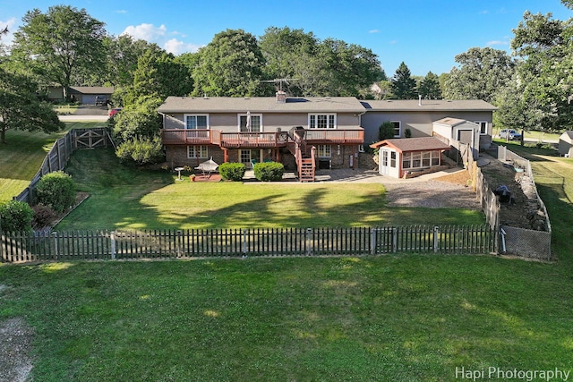 1415 Arabian Spur, Mchenry, IL 60051 - rear view of property with a wooden deck, a fenced backyard, stairs, and a chimney